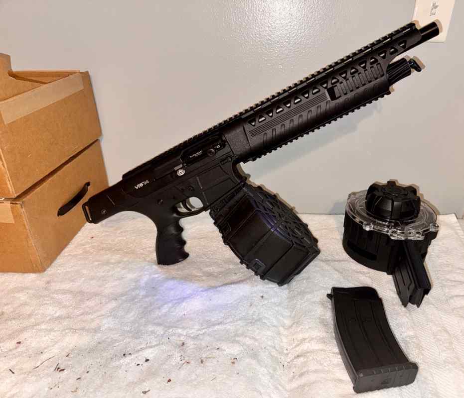 Pistol Like 12 Guage Firearm with 2 drums