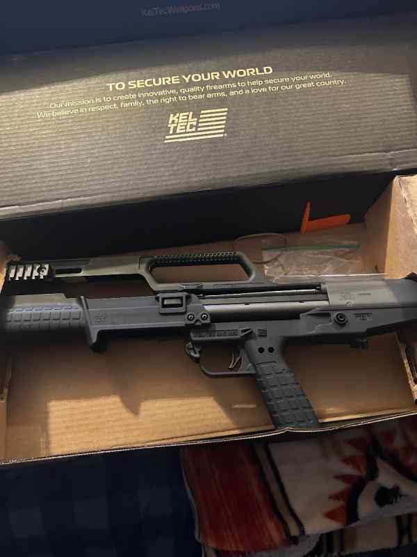 Smith &amp; Wesson 22 magnum/ keltex 410 pump shotgun
