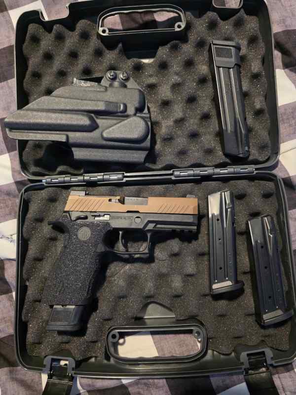 Sig P320 m18 cash or trades?  Volusia county