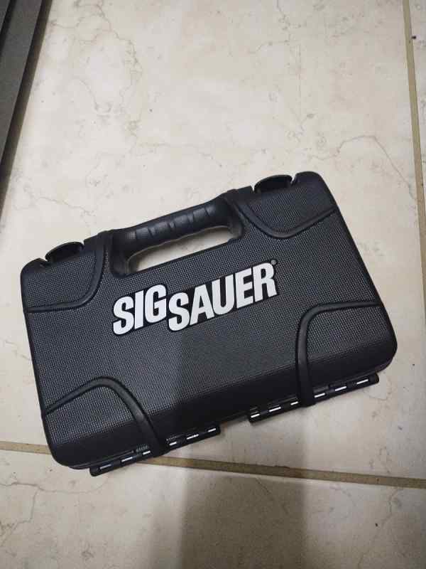 Sig Sauer P365Xl 9mm 3.7 in barrel with red dot 