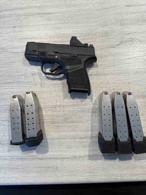 Used Springfield Hellcat 9mm, green dot and 5 mags