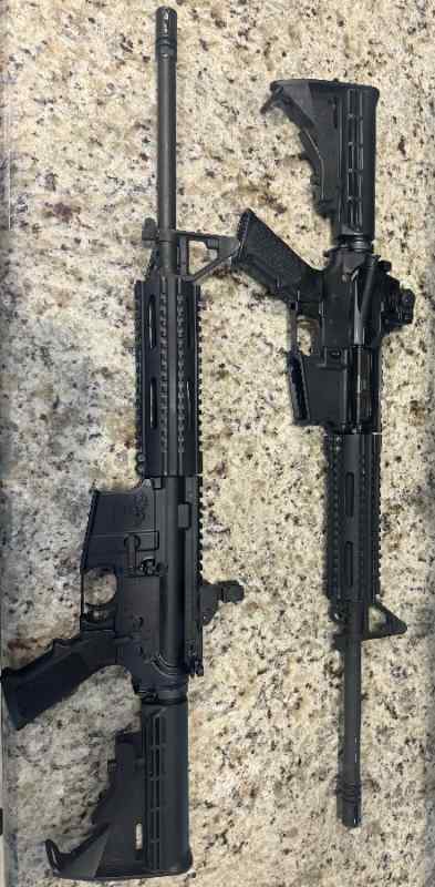 2 matching ar-15 rifles
