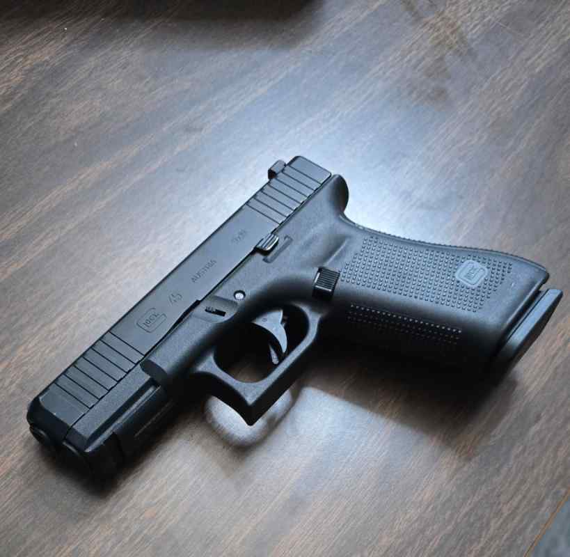 Glock 45, w/ Night sights.