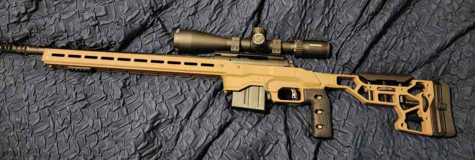 Numerous guns and optics. (KAC, Nightforce, IWI, E