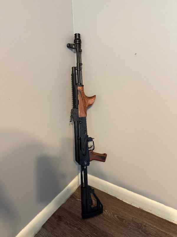 AK 103 