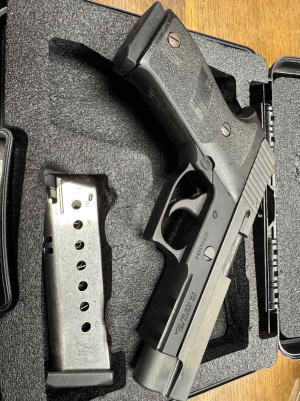 ** 2015 SIG SAUER P220 45 acp **