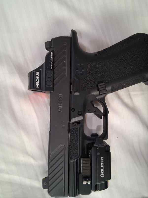 9mm shado systems with green dot and light 
